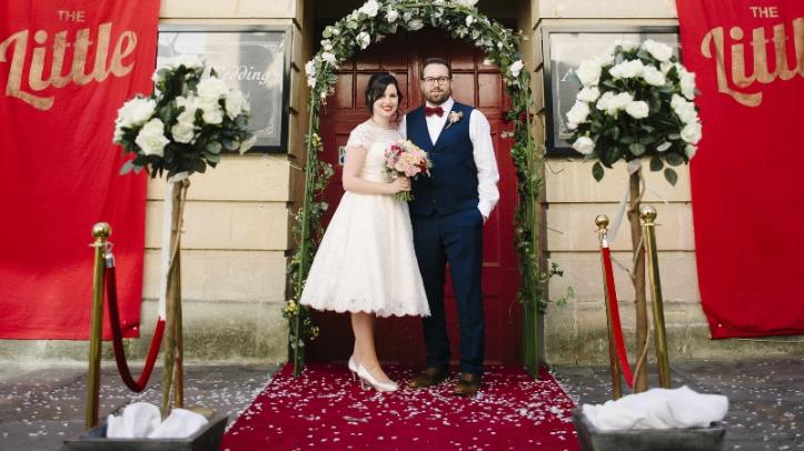 Couple outside The Little Theatre Cinema