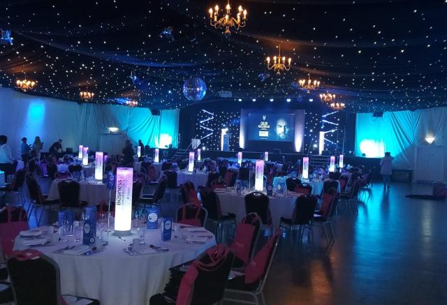 Inside pavilion in the dark with lights