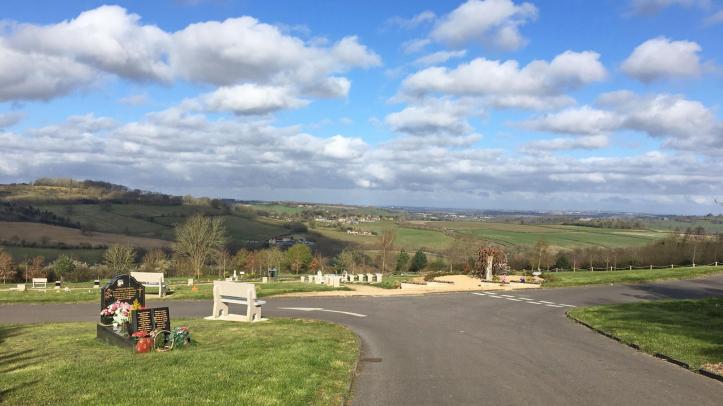 Backed granite bench overlooking views at Haycombe