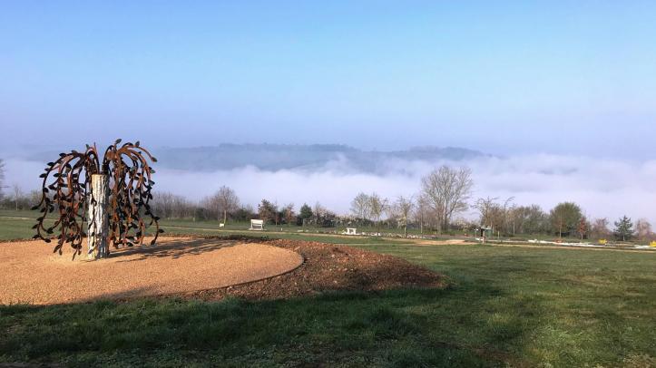 View of the Willow Tree sculpture with views at Haycombe