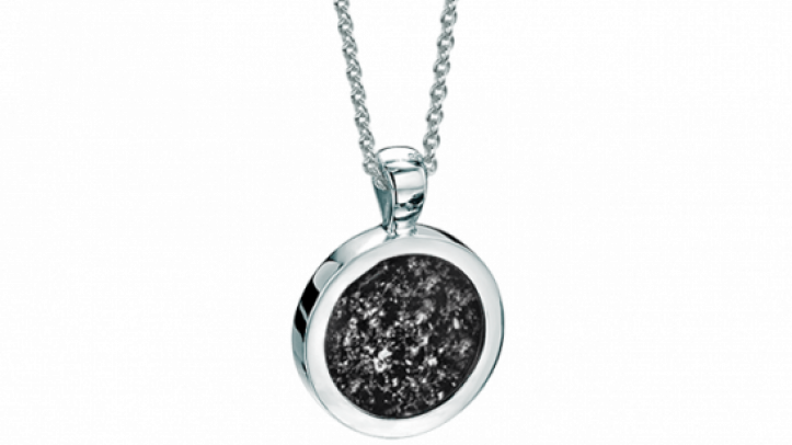 white gold and black round pendant