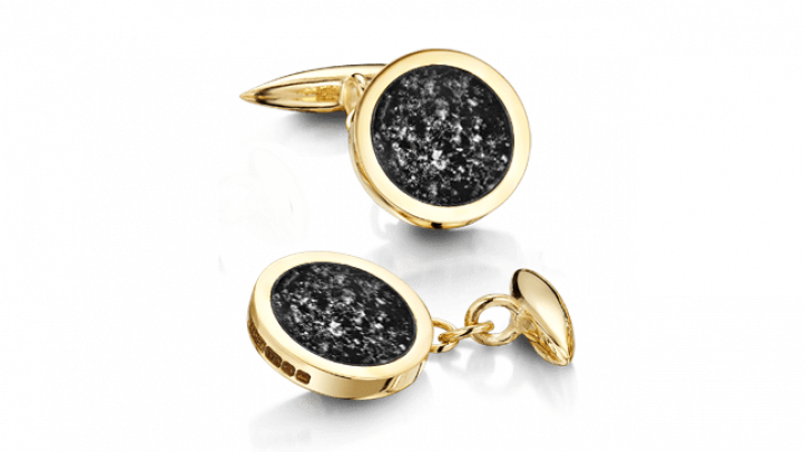 gold and black cufflinks