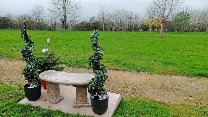 curved granite bench at Haycombe