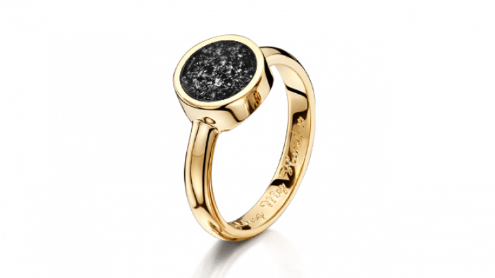 gold and black tribute ring